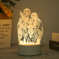 Acrylic 3D LED decorative night light glowing on a tabletop